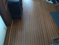 Enough Teak and Holley to have a bowling alley lane or basketball court