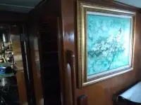Few boats have actual wall space to hang artwork paintings